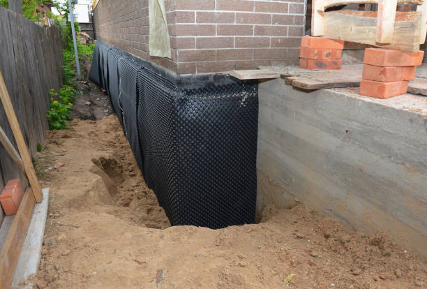 Happy homeowners after waterproofing job in Middletown